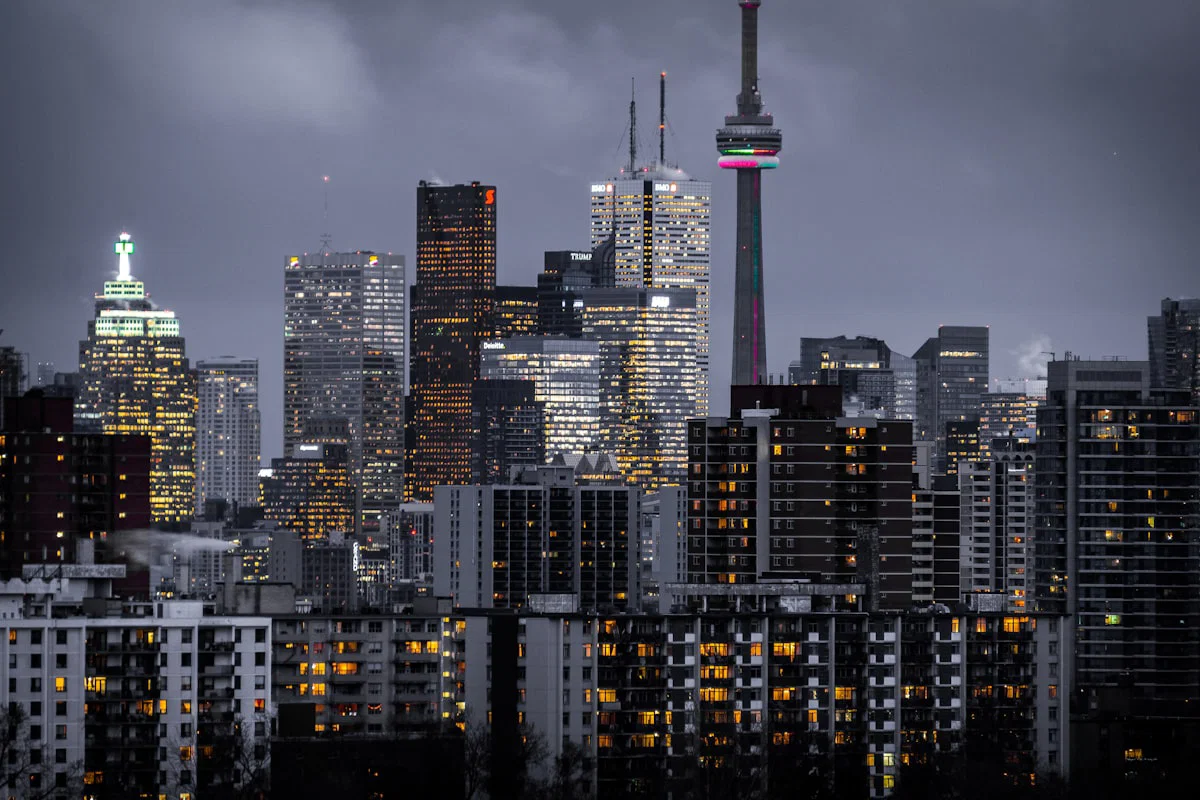 City skyline at dusk representing global net-zero demand